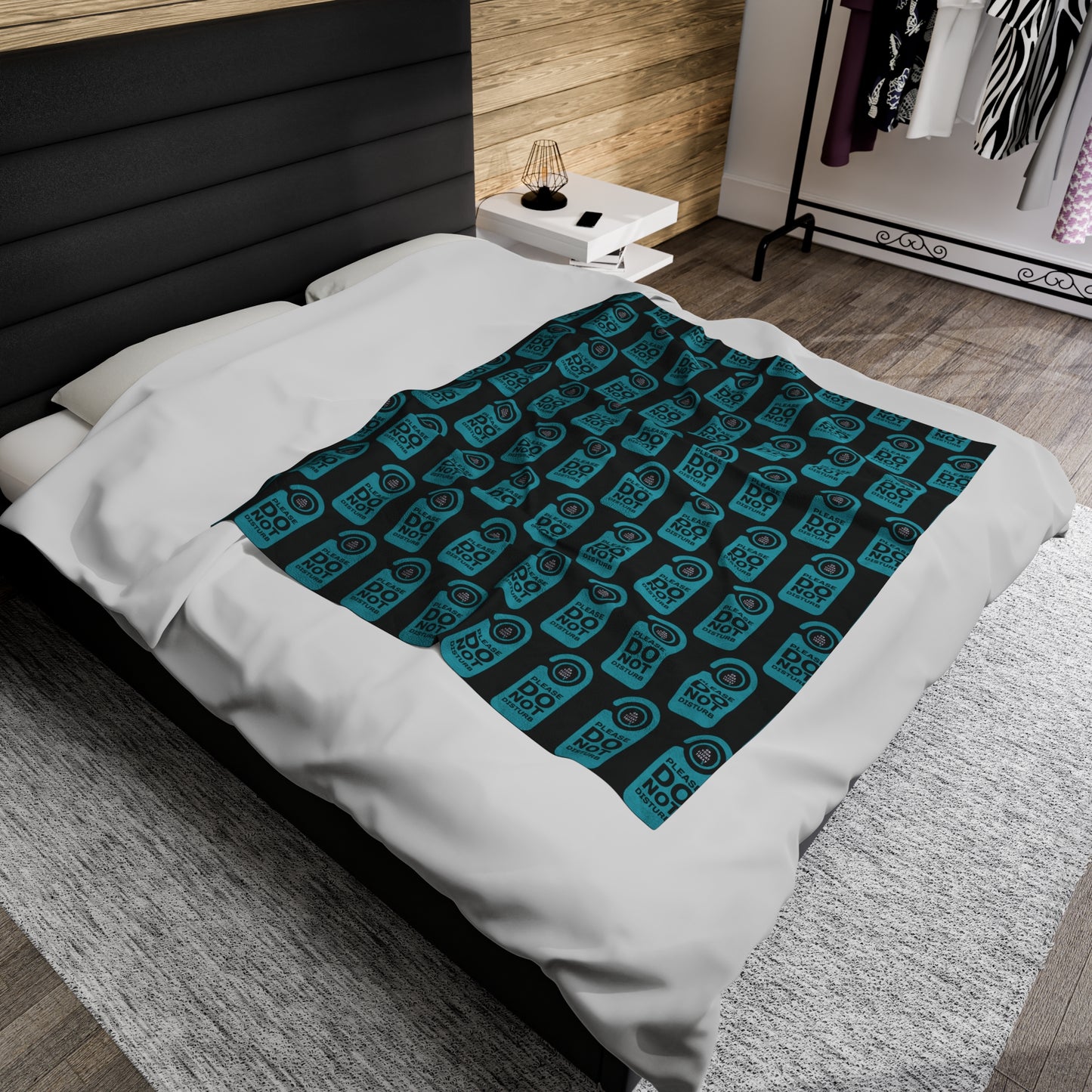 Smaller blanket on double bed.