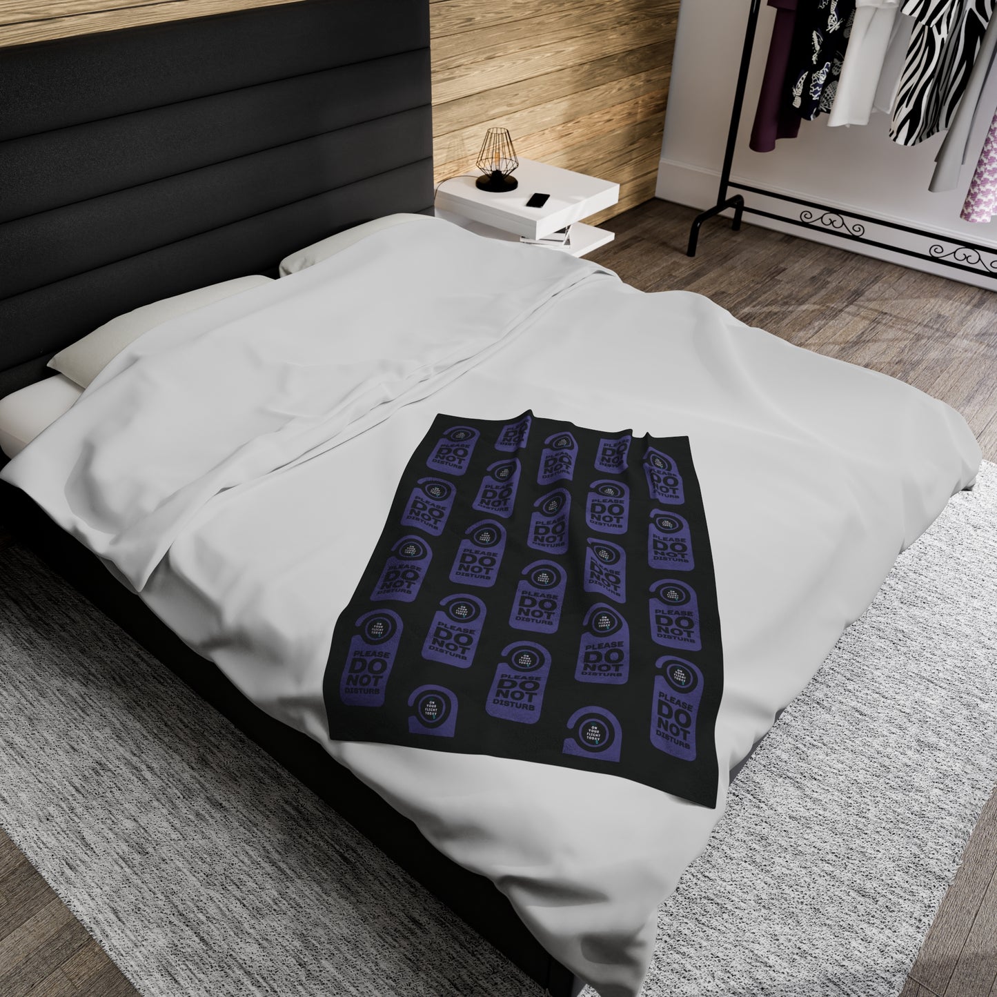 Small blanket on double bed. 