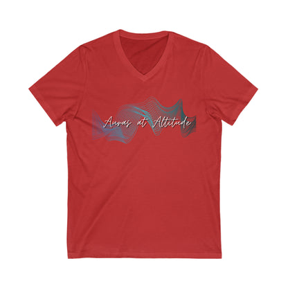 Red tee Auras at Altitude signature logo tee with text Auras of Altitude. Logo is a set of wave forms in colours green, purple and white.