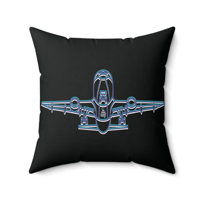 Black pillow displaying outline of the underneath of an aircraft. 