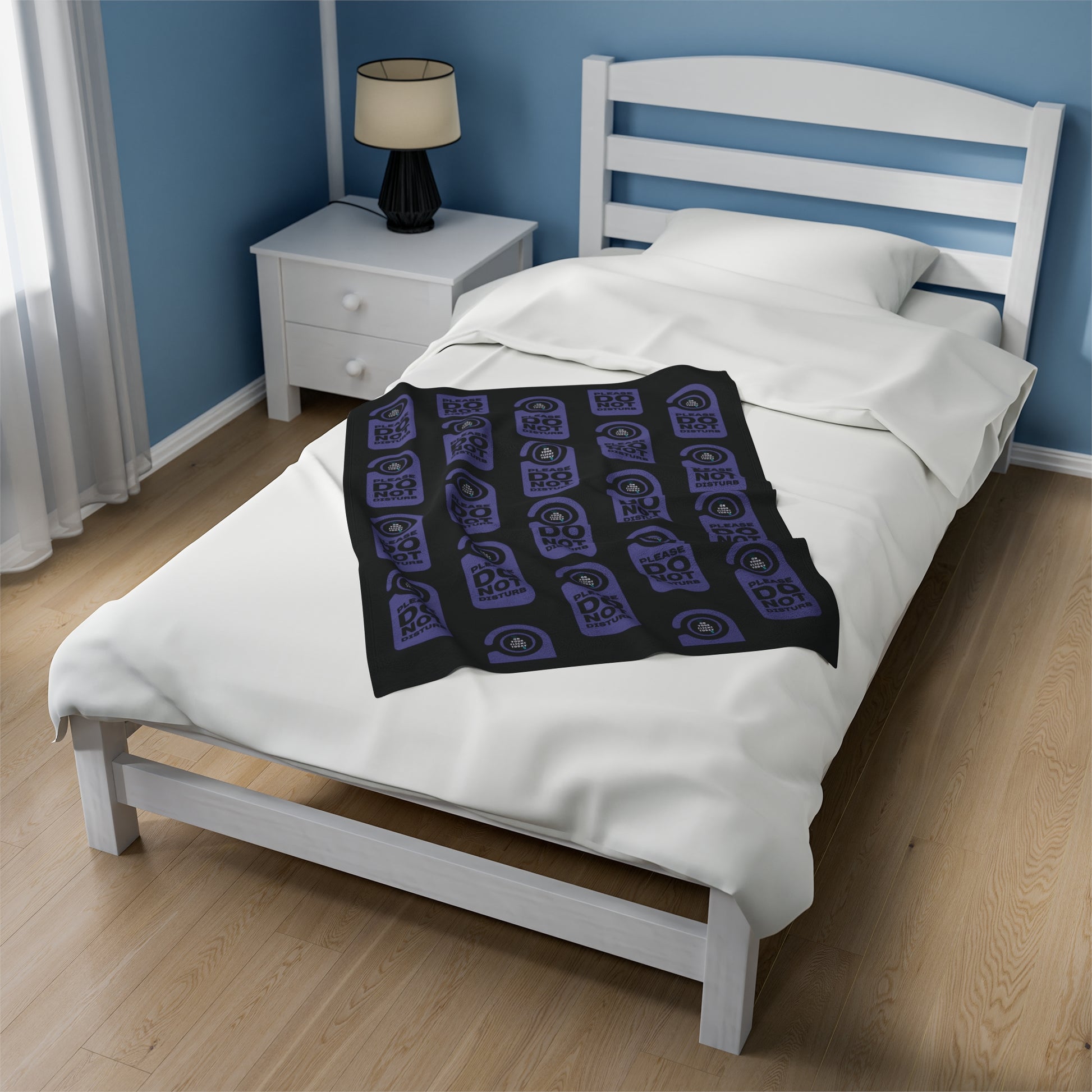 Small blanket on single bed. 