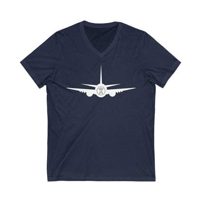 Navy tee with white airplane with the nose showing the accessibility logo of a person with their arms up and legs spread.