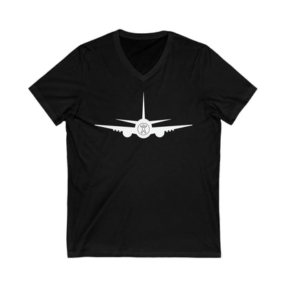 Black tee with white airplane with the nose showing the accessibility logo of a person with their arms up and legs spread.