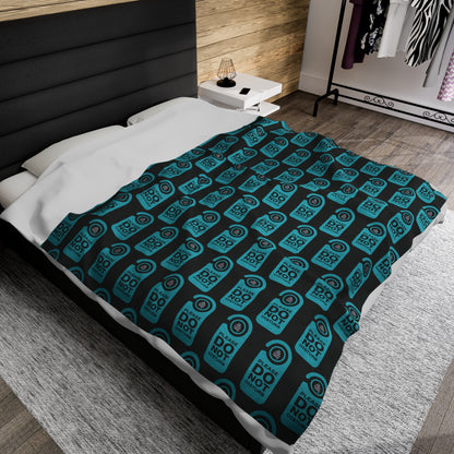 Blanket on a double bed.