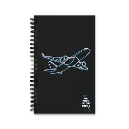 Black journal with silhouette of an airplane. 