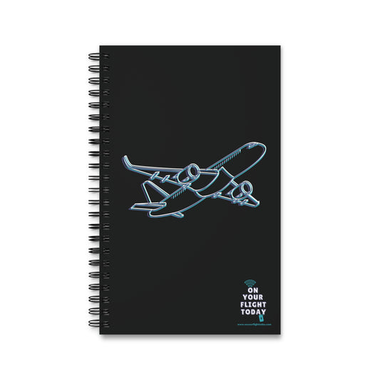 Black journal with silhouette of an airplane. 