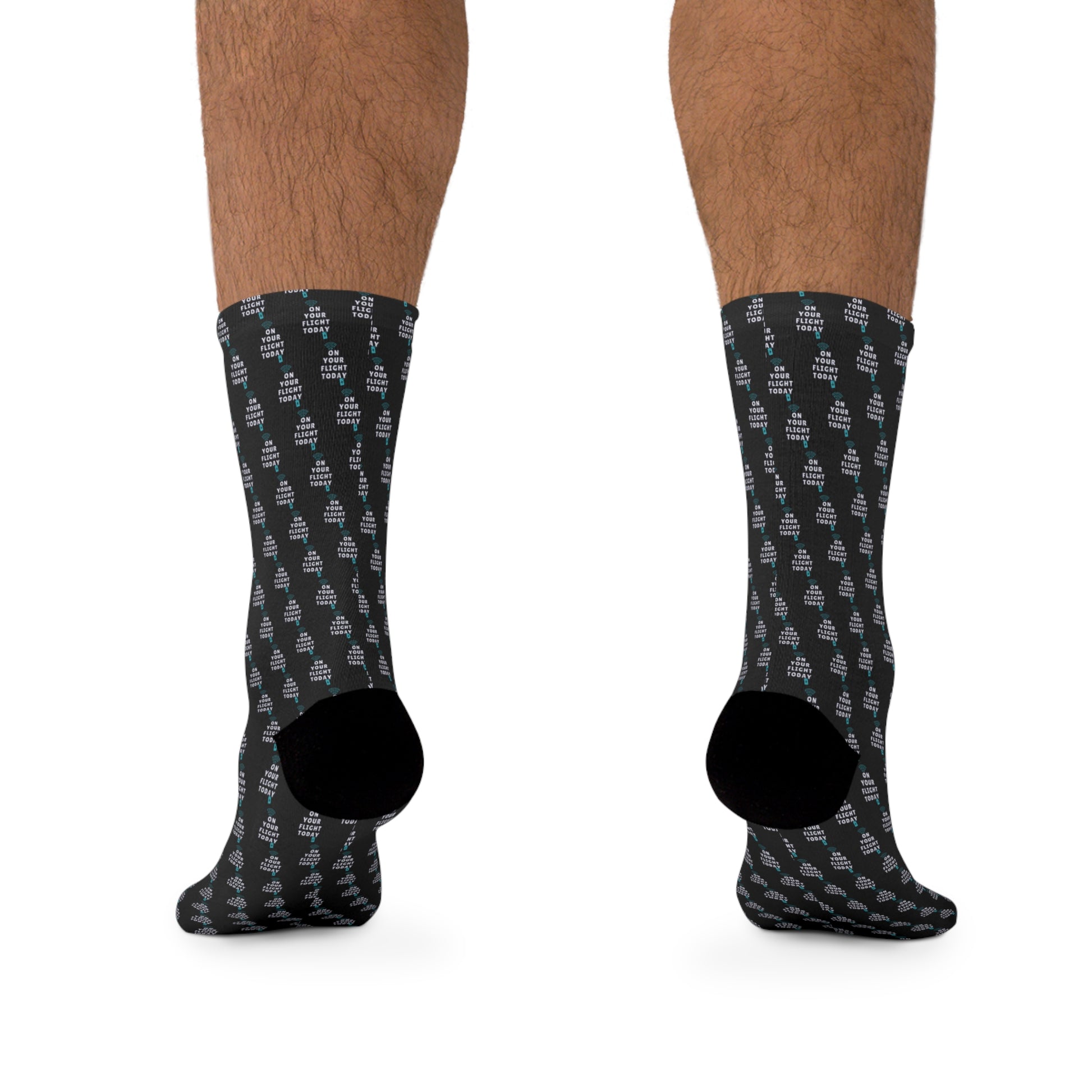 Back of Male hairy legs wearing OYFT socks