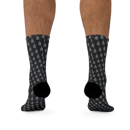 Back of Male hairy legs wearing OYFT socks