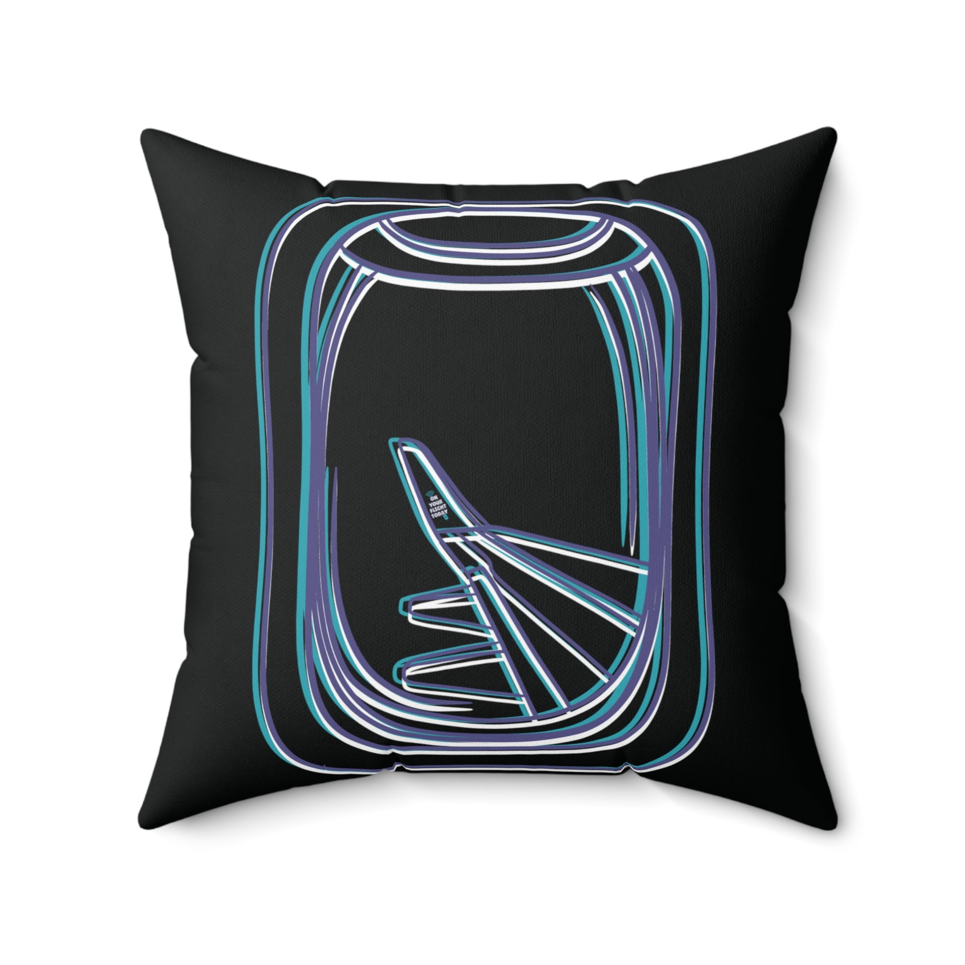 Front of pillow showing outline of airplane window and view of aircraft wing. 
