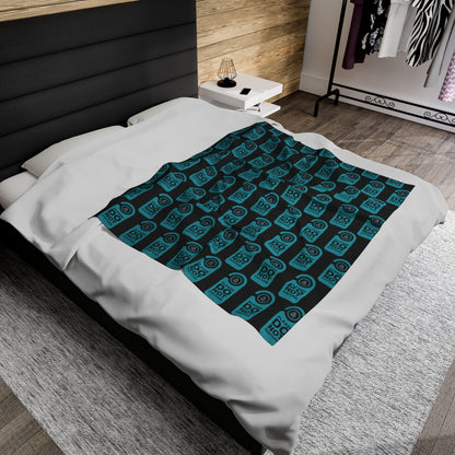 Smaller blanket on double bed.